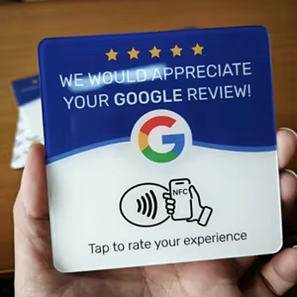 The Tap 120mm NFC review card held in hand